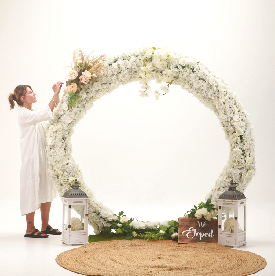 circle wedding arbor with flowers